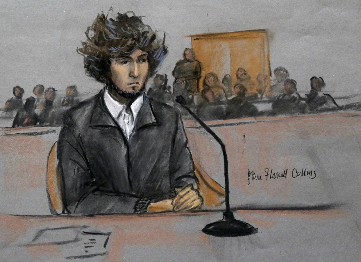 In this courtroom sketch, Boston Marathon bombing suspect Dzhokhar Tsarnaev is depicted sitting in federal court in Boston Thursday, Dec. 18, 2014, for a final hearing before his trial begins in January. Tsarnaev is charged with the April 2013 attack that killed three people and injured more than 260. He could face the death penalty if convicted. (AP Photo/Jane Flavell Collins)