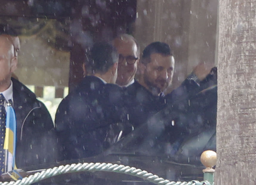 Ukrainian president Volodymr Zelenskyy, right, leaves his hotel on his way to a meeting with Italian President Sergio Mattarella, Saturday, May 13, 2023. Zelenskyy is in Italy for a one-day visit and will meet with Pope Francis at The Vatican. (AP Photo/Riccardo de Luca)