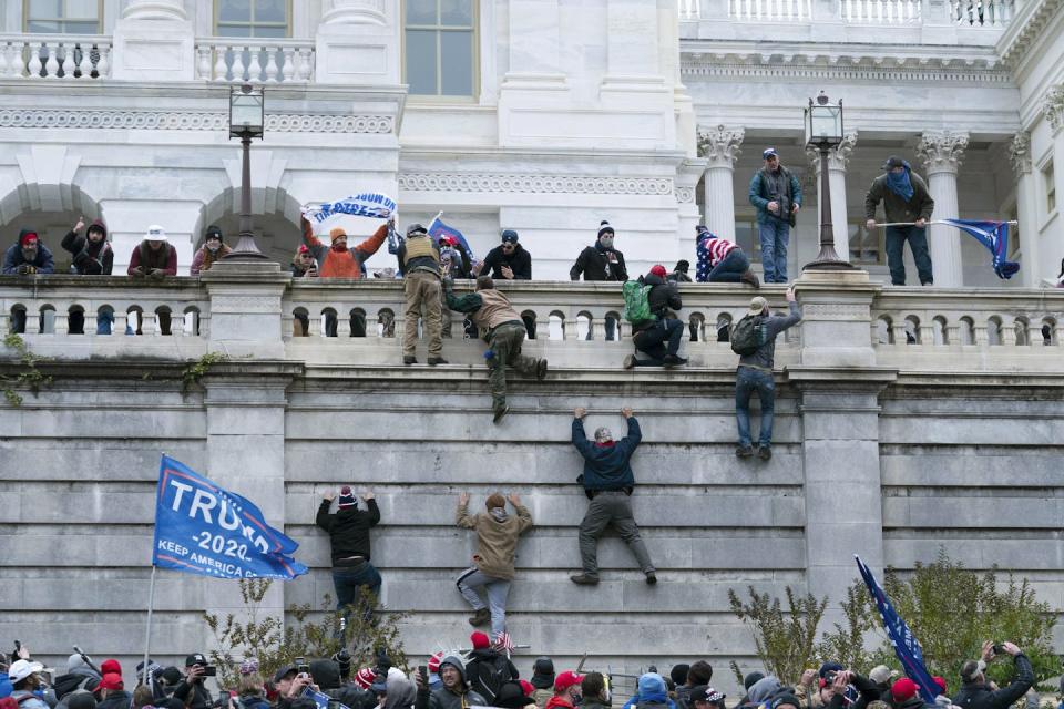 This is not what democracy looks like. <a href="https://newsroom.ap.org/detail/CapitolRiotSeattlePolice/d55c50d30d884d738559a35b01ecf9be/photo" rel="nofollow noopener" target="_blank" data-ylk="slk:AP Photo/Jose Luis Magana;elm:context_link;itc:0;sec:content-canvas" class="link ">AP Photo/Jose Luis Magana</a>