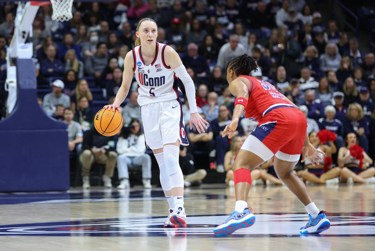 STORRS, CT - MARCH 23: UConn Huskies guard Paige Bueckers (5) defended by Jackson State Lady Tigers guard Hayleigh Breland (30) during the Jackson State Lady Tigers game versus the UConn Huskies in the first round of the NCAA Division I Women's Championship on March 23, 2024, at Harry A. Gampel Pavilion in Storrs, CT.  (Photo by M. Anthony Nesmith/Icon Sportswire via Getty Images