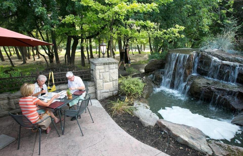 Customers seated next to a waterfall also have a view of the Boise River while dining at Bella Aquila in Eagle.