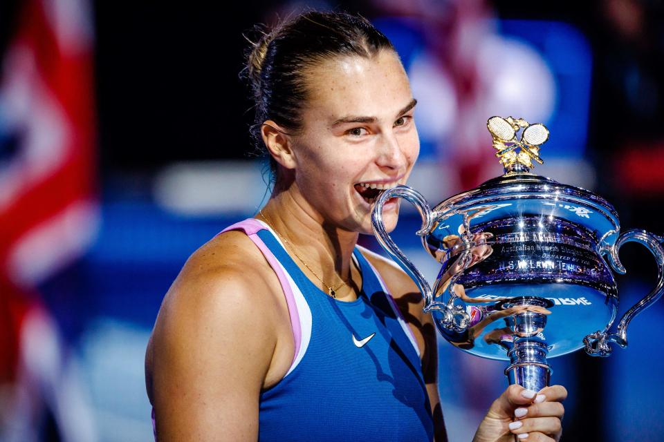 Seen here, Belarusian Aryna Sabalenka celebrates with the trophy after winning the women's final at the 2023 Australian Open. 