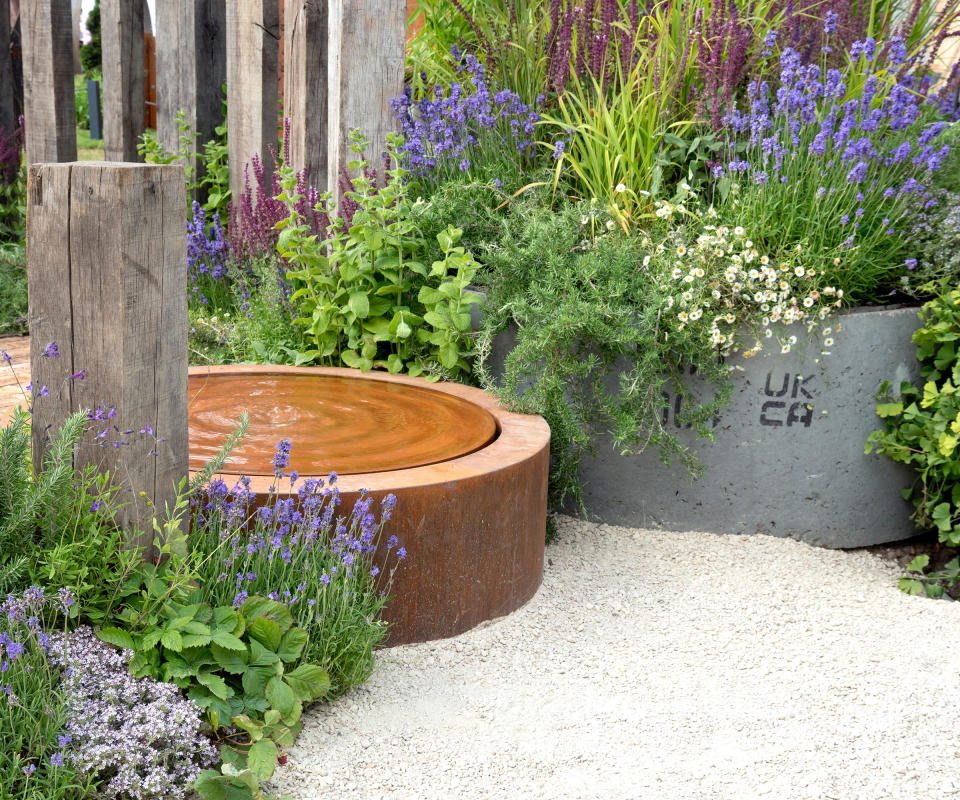 circular water feature in a gravel garden