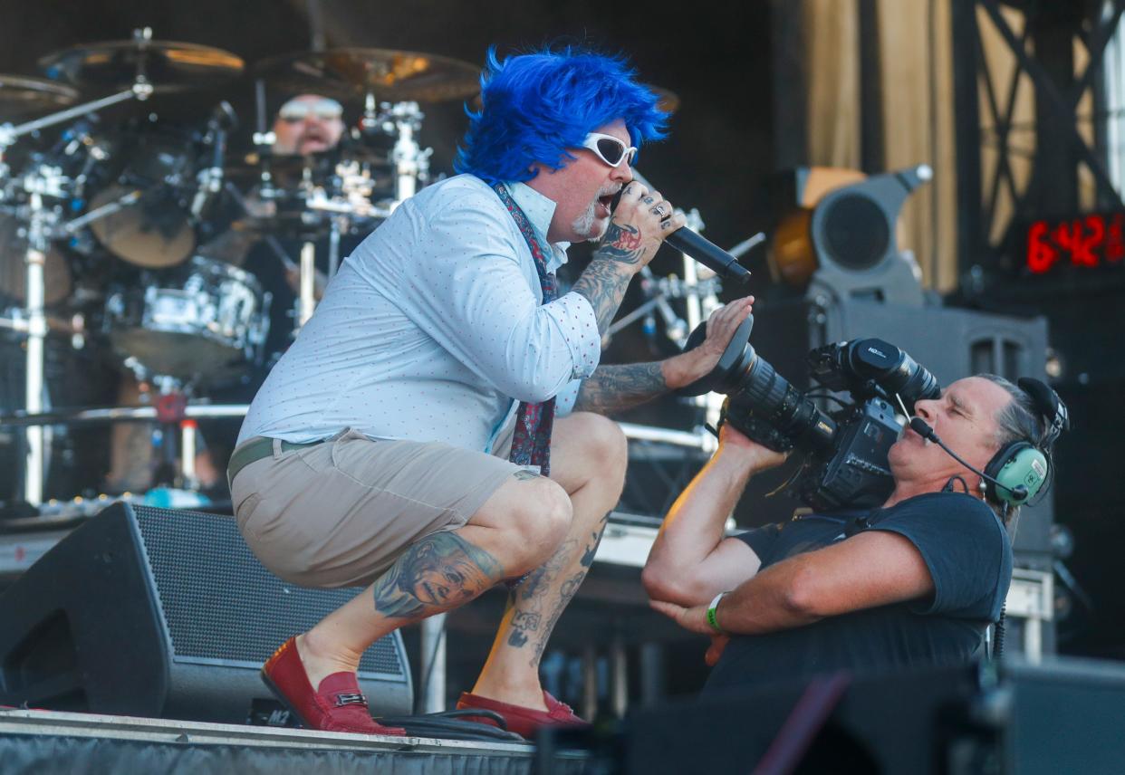 Fred Durst of Limp Bizkit blocks a video camera during the group's set at Friday's Louder Than Life music festival. Fans would complained on social media about the video feed being turned off at the demand of Durst, with thousands in attendance unable to see the band perform. Sept. 22, 2023