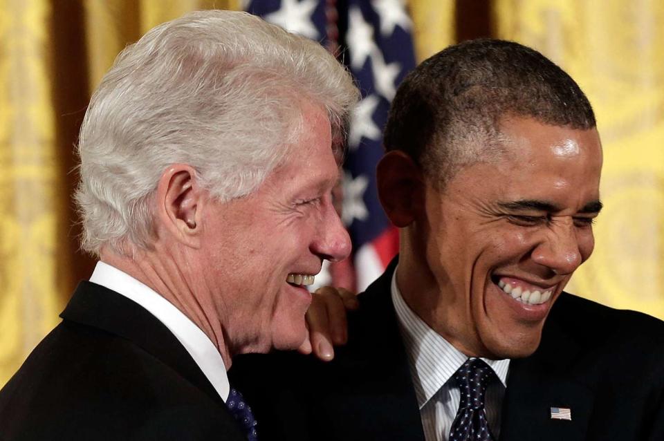 <p>Barack Obama jokes with Bill Clinton before awarding him the Presidential Medal of Freedom in the East Room at the White House on Nov. 20, 2013, in Washington, D.C.</p>