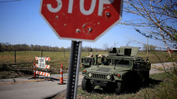 PHOTO: CADIZ, KY - MARCH 30: A Humvee from the U.S. Army's 101st Airborne Division sits parked at a checkpoint near the site where two UH-60 Blackhawk helicopters crashed on March 30, 2023 in Cadiz, Kentucky. (Luke Sharrett/Getty Images)