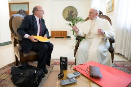 Pope Francis gestures during an exclusive interview with Reuters at the Vatican June 17, 2018.  Vatican Media/Handout via REUTERS