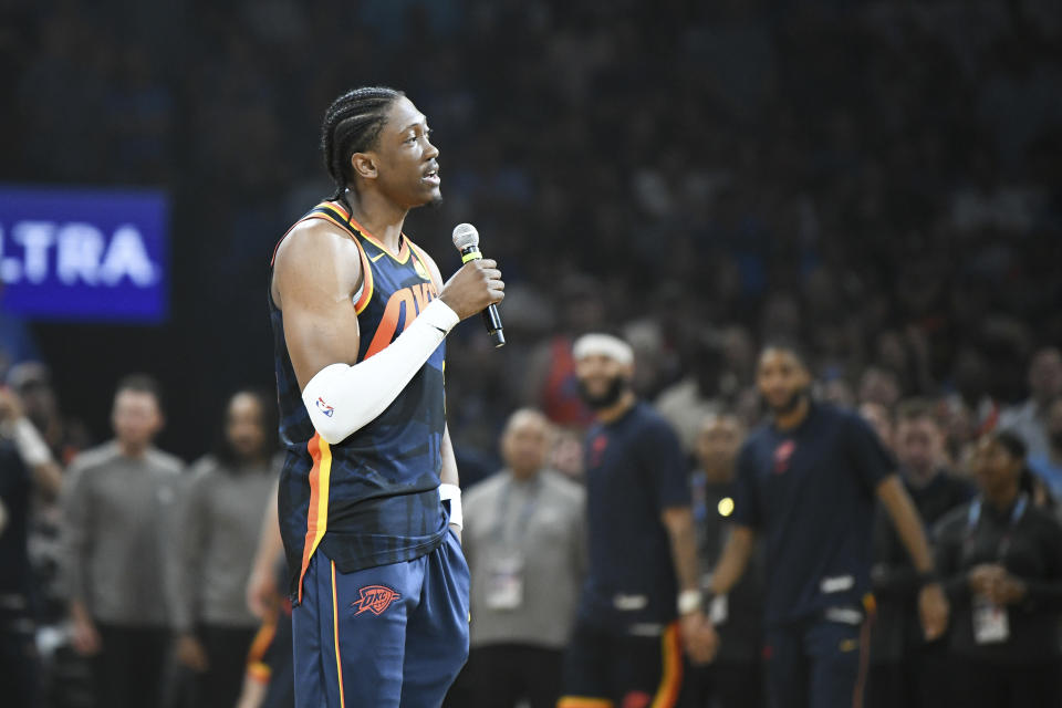 Oklahoma City Thunder forward Jalen Williams talks to the crowd before an NBA basketball game against the Dallas Mavericks, Sunday, April 14, 2024, in Oklahoma City. (AP Photo/Kyle Phillips)