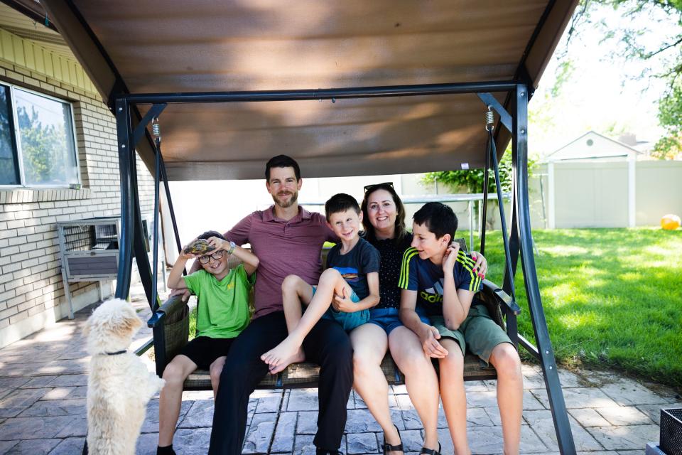Alan and Emily Perl pose for a portrait with their children, Liam, 12, Thomas, 10, and Eddie, 7, in the backyard of their home in Orem on June 21, 2023. | Ryan Sun, Deseret News
