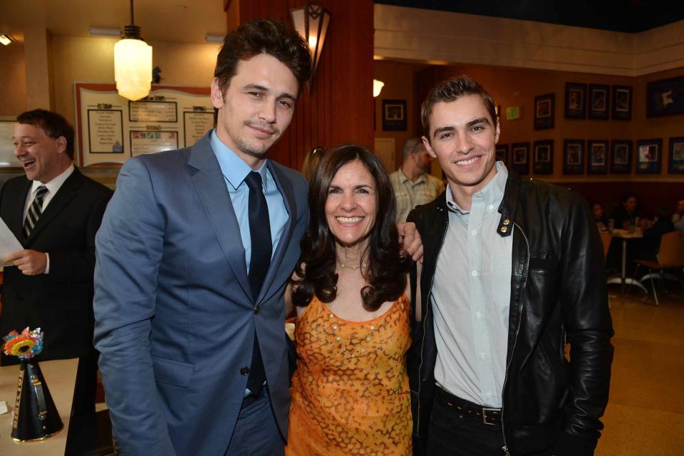 <p>Alberto E. Rodriguez/WireImage</p> James and Dave Franco with their mom, Betsy Franco, in 2013