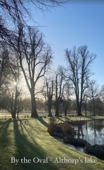 tree lined oval lake at althorp house