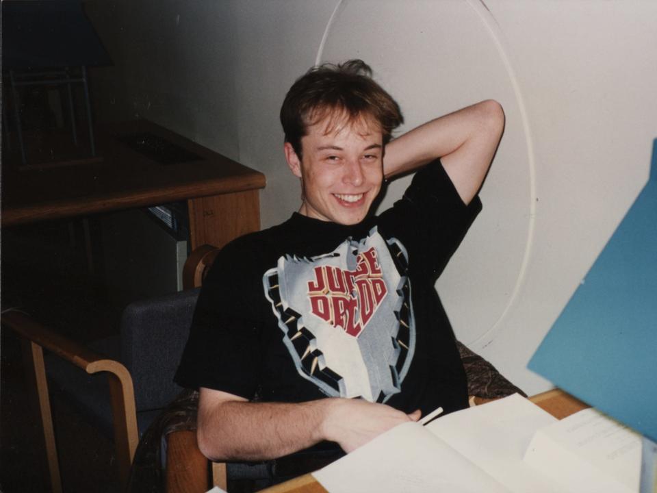 Elon Musk as a 23-year-old senior at the University of Pennsylvania in 1994, showing him happily wearing a Judge Dredd t-shirt in a fourth-floor study hall in one of the Quad towers.