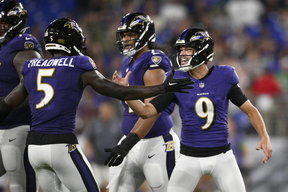 Baltimore Ravens place-kicker Justin Tucker (9) celebrates with Laquon Treadwell after kicking a field goal during the first half of an NFL preseason football game against the Philadelphia Eagles in Baltimore, Saturday, Aug. 12, 2023. (AP Photo/Nick Wass)