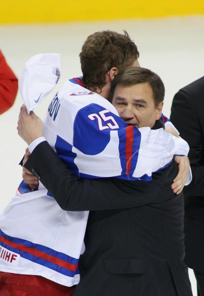 BUFFALO, NY - JANUARY 05: Yevgeni Kuznetsov #25 and Russian head coach Valeri Bragin embrace after defeting Canada 5-3 during the 2011 IIHF World U20 Championship Gold medal game between Canada and Russia at the HSBC Arena on January 5, 2011 in Buffalo, New York. (Photo by Rick Stewart/Getty Images)