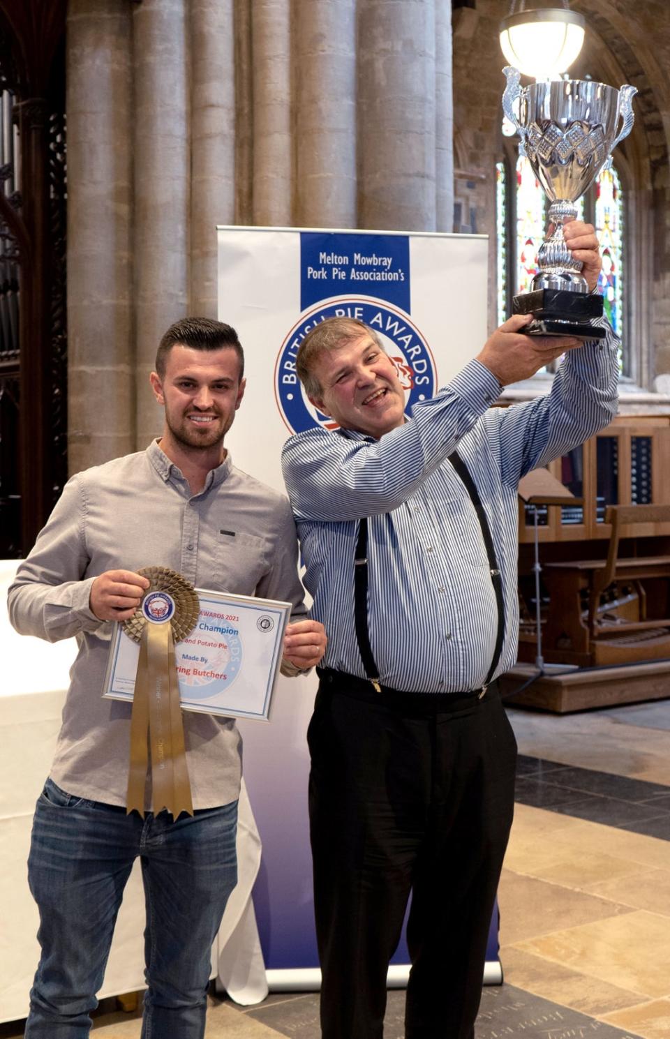 The winner of the Supreme Champion of the 2021 British Pie Awards, Robert Bowring and his son George (Martin Elliott/British Pie Awards/PA) (PA Media)