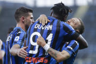 Atalanta's Duvan Zapata celebrates with his teammate Papu Gomez, right, after scoring his side's fourth goal during the Serie A soccer match between Atalanta and Sassuolo at the Gewiss Stadium in Bergamo, Italy, Sunday, June 21, 2020. Atalanta is playing its first match in Bergamo since easing of lockdown measures, in the area that has been the epicenter of the hardest-hit province of Italy's hardest-hit region, Lombardy, the site of hundreds of COVID-19 deaths. (AP Photo/Luca Bruno)
