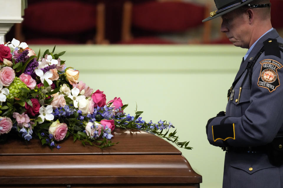 A member of the Georgia State Patrol honor guard stands at the casket before the funeral service for former first lady Rosalynn Carter at Maranatha Baptist Church, Wednesday, Nov. 29, 2023, in Plains, Ga. The former first lady died on Nov. 19. She was 96. (AP Photo/Alex Brandon, Pool)