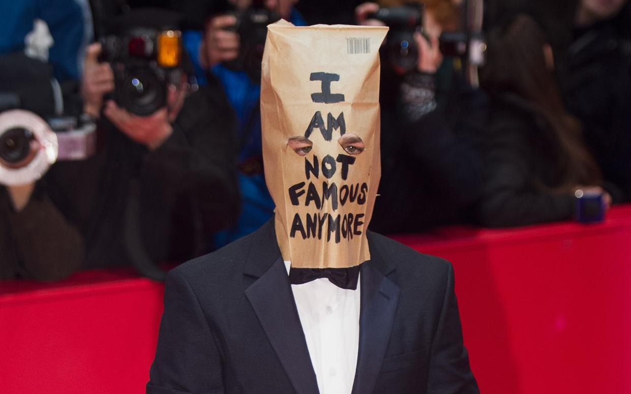 The actor walked the red carpet at the Berlin Film Festival in 2014 with a paper bag on his head