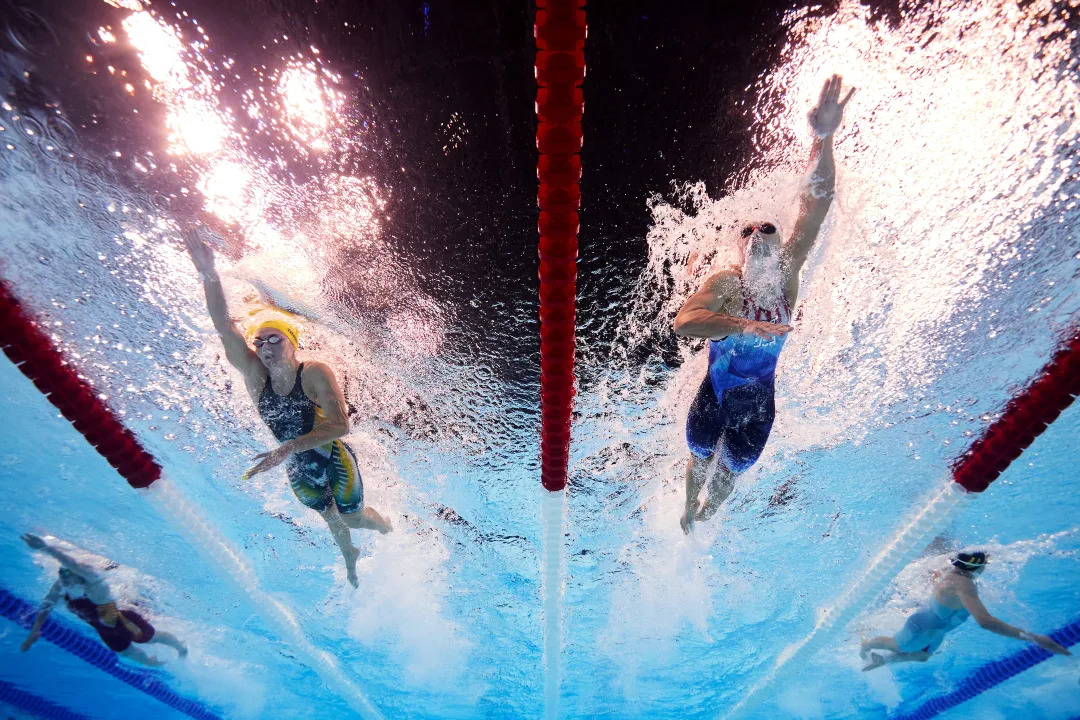 NANTERRE, FRANCE - JULY 27: (EDITORS NOTE: Image was captured using an underwater robotic camera.) Ariarne Titmus of Team Australia and Katie Ledecky of Team United States compete in the Women's 400m Freestyle Heats on day one of the Olympic Games Paris 2024 at Paris La Defense Arena on July 27, 2024 in Nanterre, France. (Photo by Adam Pretty/Getty Images)