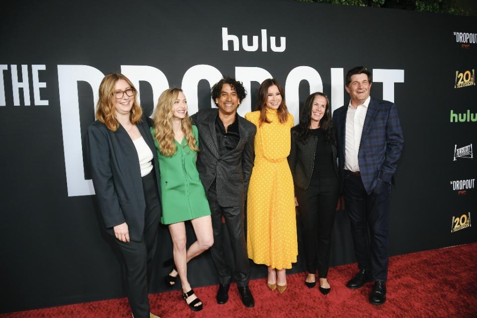 Seyfried with castmates and teammates from ‘The Dropout’ finale on April 11. - Credit: Michael Buckner for Variety