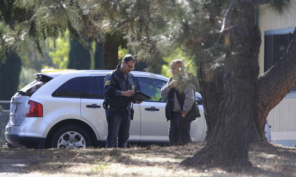 <p>Law enforcement officers are seen at an elementary school in the community of Rancho Tehama Reserve, where a gunman opened fire Tuesday, Nov. 14, 2017, in Corning, Calif. A gunman choosing targets at random opened fire in the rural Northern California town Tuesday, killing several people at several sites and wounding others at the elementary school before police shot him dead, authorities said. (AP Photo/Rich Pedroncelli) </p>