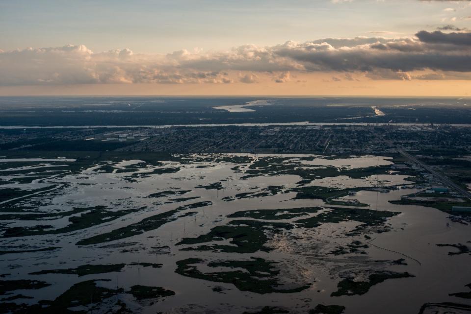 Chemical plants and factories line the roads and suburbs of the area known as 'Cancer Alley' October 15, 2013.