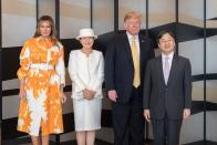 <p>Wearing a bright Carolina Herrera frock, President Trump and Melania were the first major state officials to meet Japan's newest Emperor during their joint state tour in May 2019. </p>