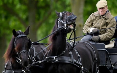 The Duke of Edinburgh sits on a carriage during the Royal Windsor Horse Show - Credit: REX