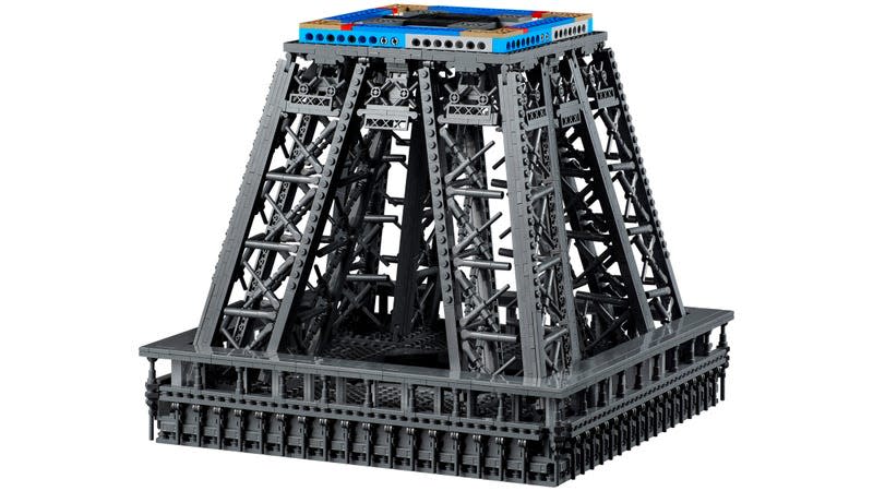 A close-up of the mid-section of the Lego Eiffel Tower, revealing the complex part assembly recreating the tower's intricate metal work.
