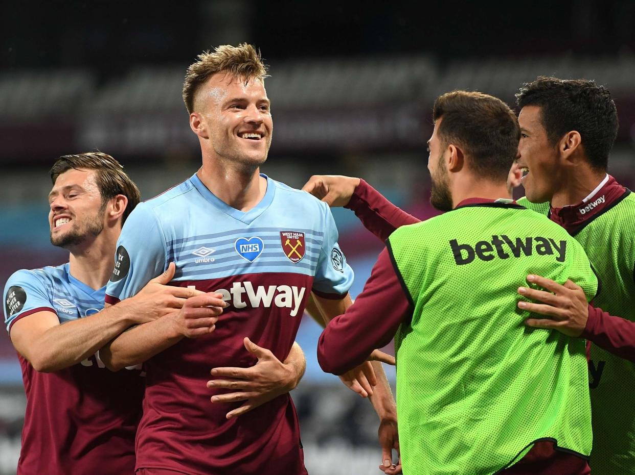 Andriy Yarmolenko celebrates with his West Ham teammates: Getty