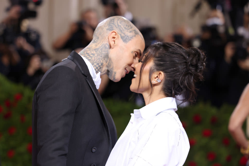 Kourtney Kardashian is being celebrated for finding love later in life, pictured with new husband Travis Barker in May 2022 at the Met Gala. (Getty Images)