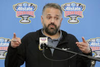 FILE - In this Dec. 27, 2019, file photo, Baylor head coach Matt Rhule takes questions from the media as his team arrives for the Sugar Bowl NCAA college football game against Georgia at Louis Armstrong International Airport, in New Orleans. A person familiar with the situation says the Carolina Panthers are completing a contract to hire Baylor's Matt Rhule as their coach. The person spoke to The Associated Press on Tuesday, Jan. 7, 2020, on condition of anonymity because the deal is not done. The Panthers have not spoken publicly about the coaching search. (Curtis Compton/Atlanta Journal-Constitution via AP, File)
