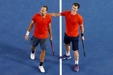 Britain's Jamie Murray (R) and Brazil's Bruno Soares celebrate after winning their doubles final match at the Australian Open tennis tournament at Melbourne Park, Australia, January 31, 2016. REUTERS/Jason Reed