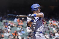 Los Angeles Dodgers' Yoshi Tsutsugo hits an RBI-single against the San Francisco Giants during the second inning of a baseball game in San Francisco, Sunday, May 23, 2021. (AP Photo/Jeff Chiu)