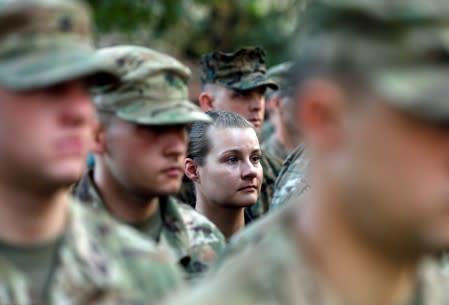 U.S. soldiers take part in a memorial ceremony to commemorate the 16th anniversary of the 9/11 attacks, in Kabul