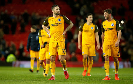 Soccer Football - Premier League - Manchester United vs Brighton & Hove Albion - Old Trafford, Manchester, Britain - November 25, 2017 Brighton’s Shane Duffy and Dale Stephens look dejected after the match REUTERS/Andrew Yates