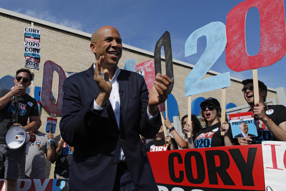 In this Aug. 9, 2019 photo, Democratic presidential candidate Sen. Cory Booker speaks to supporters before the Iowa Democratic Wing Ding at the Surf Ballroom in Clear Lake, Iowa. Months after Cory Booker took office as mayor of Newark, N.J. in 2006, he enabled his law partner to take power at the nonprofit that supplied water to 500,000 state residents. During the ensuing seven years, allies of the two-term mayor wasted millions of dollars in public money at the Newark Watershed Conservation and Development Corporation. Booker says he was unaware of the corruption, which ultimately destroyed the nonprofit created to protect one of Newark’s most valuable assets. (AP Photo/John Locher)