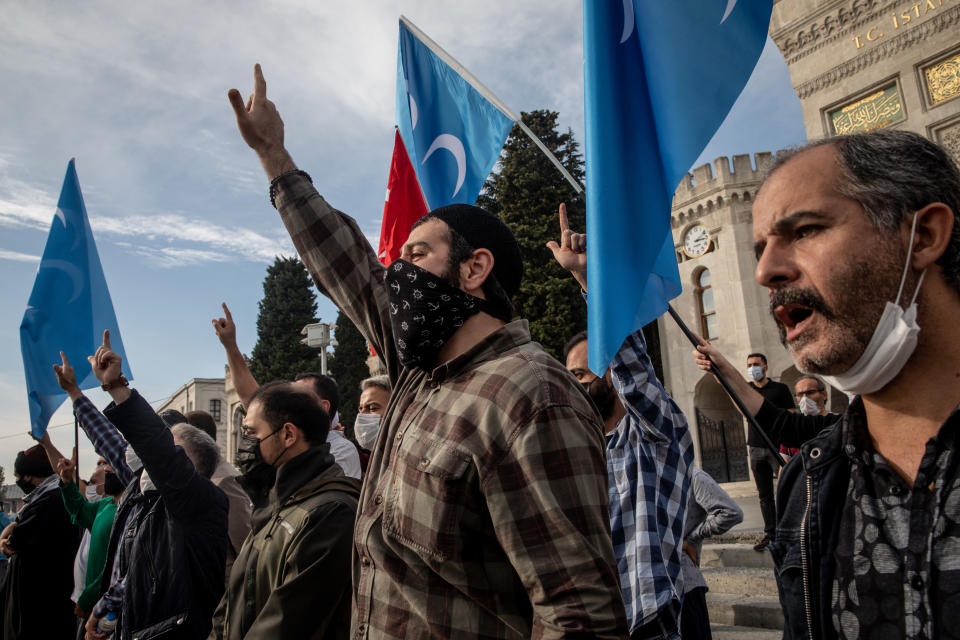 ISTANBUL, TURKEY - OCTOBER 25: People shout slogans during a protest against French president Emmanuel Macron on October 25, 2020 in Istanbul, Turkey. People gathered to protest against the recent statements by French President Emmanuel Macron regarding the beheading of a teacher that displayed cartoons of Prophet Muhammad in his class and the closure of some mosques in France. (Photo by Chris McGrath/Getty Images)