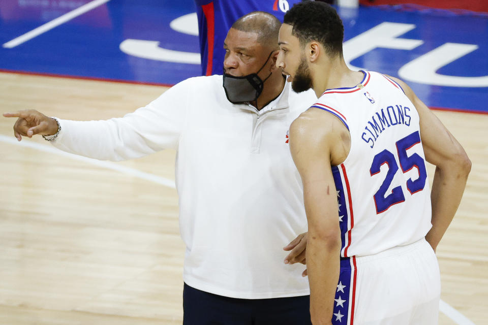 Head coach Doc Rivers of the Philadelphia 76ers speaks with Ben Simmons #25 during the first quarter against the Atlanta Hawks at Wells Fargo Center on April 28, 2021 in Philadelphia, Pennsylvania. NOTE TO USER: User expressly acknowledges and agrees that, by downloading and or using this photograph, User is consenting to the terms and conditions of the Getty Images License Agreement. (Photo by Tim Nwachukwu/Getty Images)