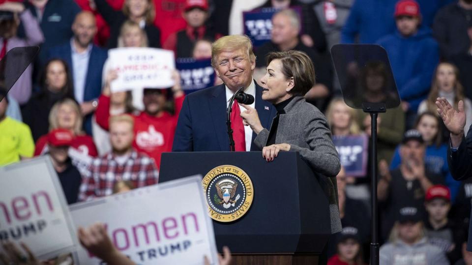 PHOTO: Iowa Governor Kim Reynolds speaks as President Donald Trump listens during a rally in Des Moines, Iowa, Jan. 30, 2020. (Bloomberg via Getty Images, FILE)