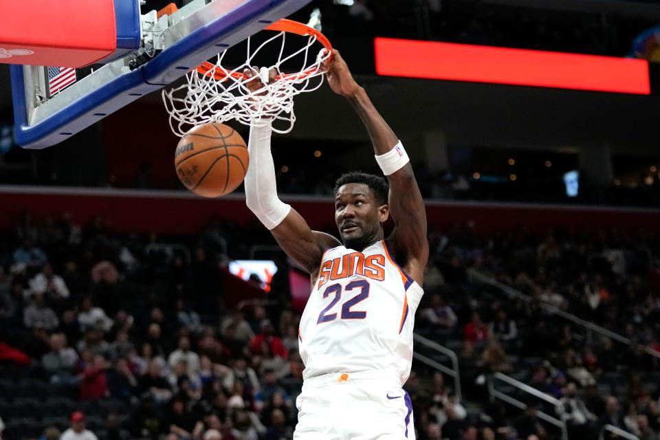 Phoenix Suns center Deandre Ayton (22) dunks against the Detroit Pistons in the first half of an NBA basketball game in Detroit, Saturday, Feb. 4, 2023. (AP Photo/Paul Sancya)