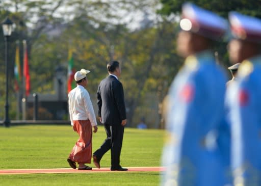 Xi Jinping (with Myanmar President Win Myint, L) told Myanmar leaders they would usher in a new era of relations between the neighbours