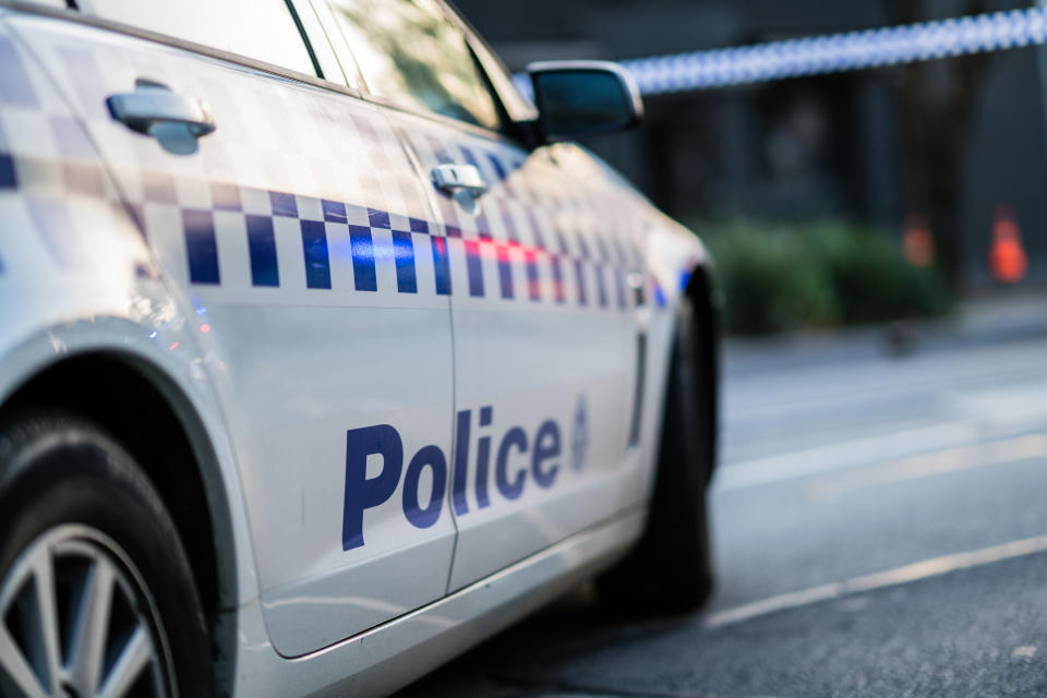 A photo of a police car, one of the emergency vehicles you have to move out of the way for.