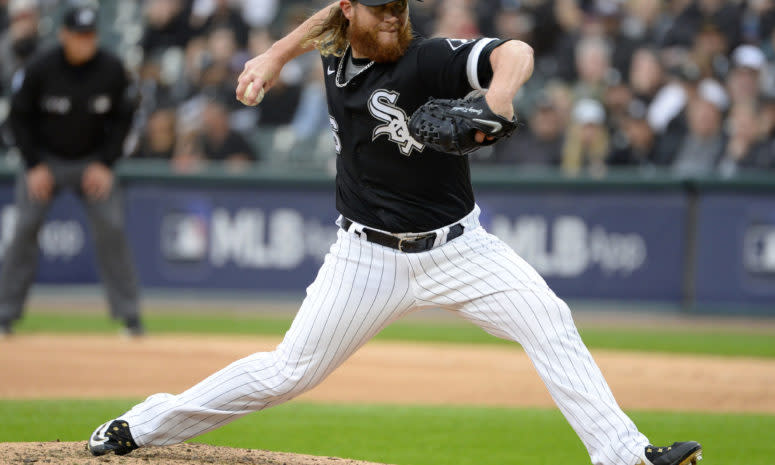 White Sox pitcher Craig Kimbrel delivers a pitch in a game.