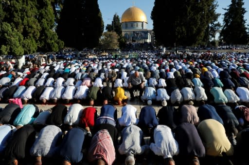 Thousands of Palestinians prayed at the Al-Aqsa mosque in Jerusalem at the start of the Muslim Eid al-Adha holiday