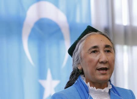 Uighur leader Rebiya Kadeer delivers a speech in front of a East Turkestan flag at the fourth General Assembly of the World Uyghur Congress (WUC) in Tokyo in this May 14, 2012 file photo. REUTERS/Yuriko Nakao/Files