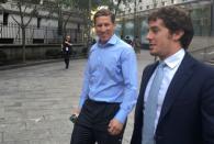 Former Perella Weinberg investment banker Sean Stewart (L) walks out of federal court after a hearing before his insider trading trail in Manhattan borough of New York, July 15, 2016. REUTERS/Nate Raymond