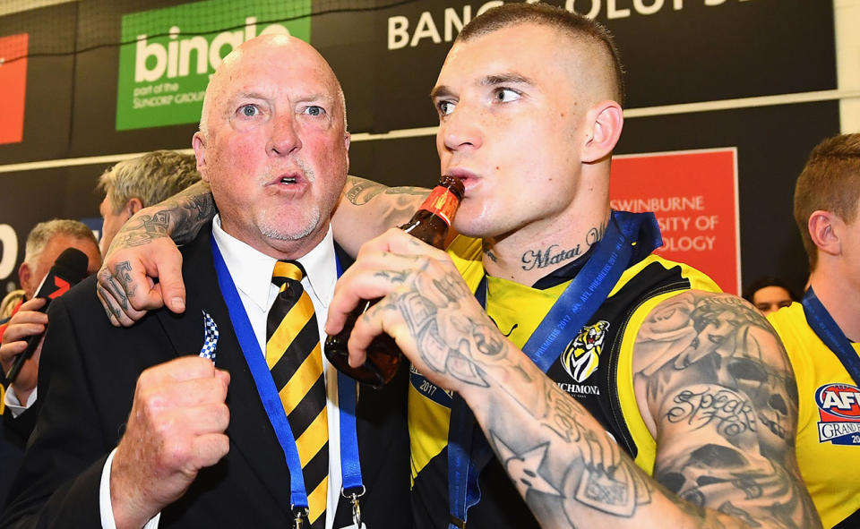 Rex Hunt, pictured here with Dustin Martin after the AFL grand final in 2017.