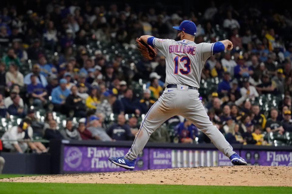 New York Mets shortstop Luis Guillorme pitches during the eighth inning Monday against the Brewers.