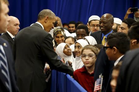 U.S. President Barack Obama greets students after his remarks at the Islamic Society of Baltimore mosque in Catonsville, Maryland February 3, 2016. REUTERS/Jonathan Ernst